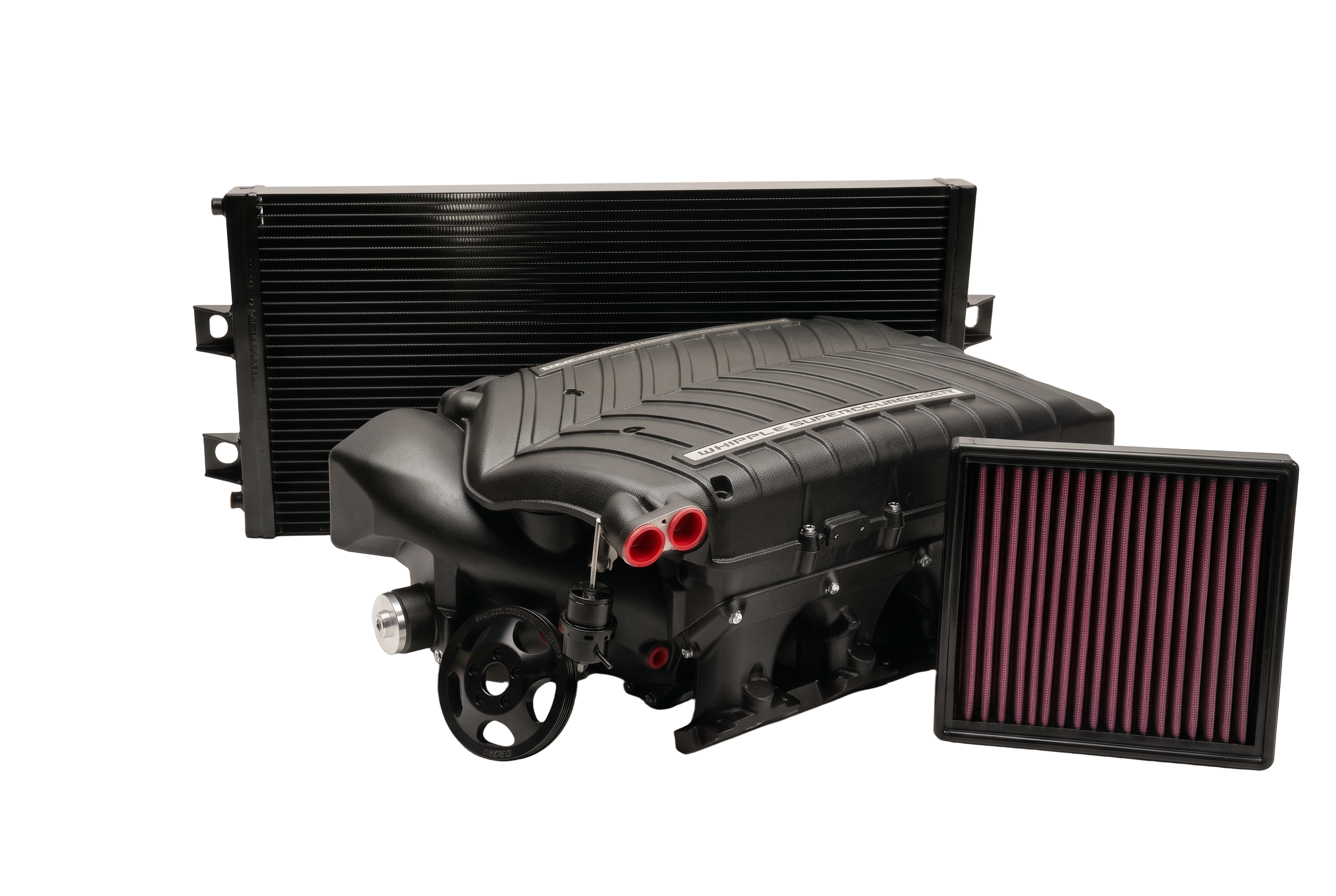 Black Whipple top-mount twin-screw supercharger kit with intercooler and intake filter on a dark studio backdrop